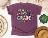 First Grade Bow Hearts in Berry Comfort Colors 1717 tee