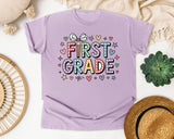 First Grade Bow Hearts in Orchid Comfort Colors 1717 tee