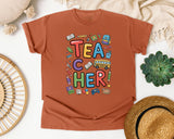 Teacher School Supplies Stacked in Yam Comfort Colors 1717 tee