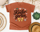 Kindergarten Script Bow in Yam Comfort Colors 1717 tee