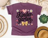 Kindergarten Script Daisy Bow in Berry Comfort Colors 1717 tee