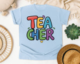 Teacher Bright Block Letters in Chambray Comfort Colors 1717 tee
