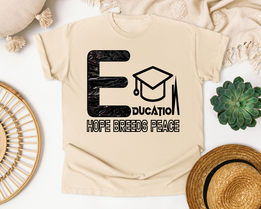 Education Hope Breeds Peace in Ivory Comfort Colors 1717 tee