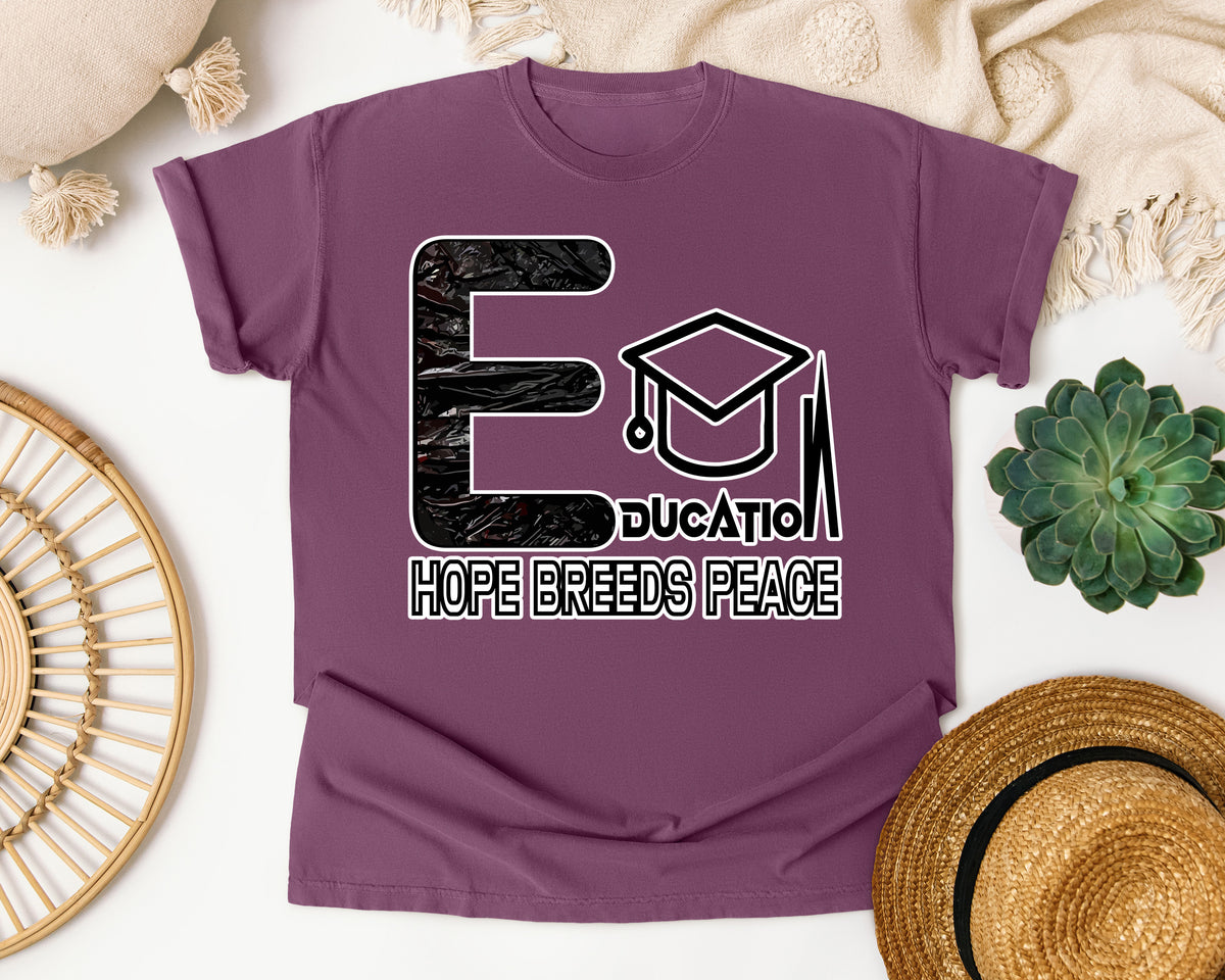 Education Hope Breeds Peace Dark Print in Berry Comfort Colors 1717 tee