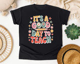 It's A Good Day To Teach Daisy in Black Comfort Colors 1717 tee
