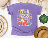 It's A Good Day To Teach Daisy in Violet Comfort Colors 1717 tee