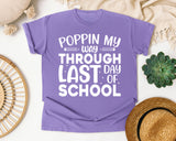 Poppin My Way Through Last Day Of School White 2 graphic tee in Violet