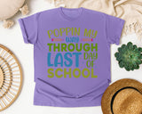 Poppin My Way Through Last Day Of School Grey graphic tee in Violet