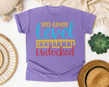 3rd Grade Level Unlocked Teal graphic tee in Violet