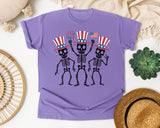 Three Dancing Patriotic Skeletons graphic tee in Violet