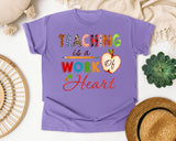 Teaching Is A Work Of Heart graphic tee in Violet