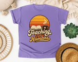 Teaching Tiny Humans Retro Sunset graphic tee in Violet
