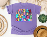 Its A Beautiful Day For Learning graphic tee in Violet