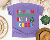 Keep Calm And Welcome Back To School Backpack graphic tee in Violet