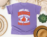 Not All Heroes Wear Capes Some Wear Dad Jokes Orange 2 graphic tee in Violet