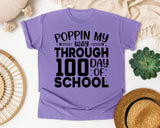 Poppin My Way Through 100 Days Of School White graphic tee in Violet