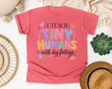 I Teach Tiny Humans With Big Feelings graphic tee in Watermelon