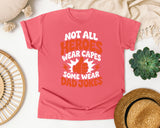 Not All Heroes Wear Capes Some Wear Dad Jokes Orange 2 graphic tee in Watermelon