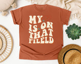 My Heart Is On That Field Groovy graphic tee in Yam