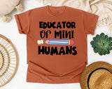 Educator Of Mini Humans graphic tee in Yam