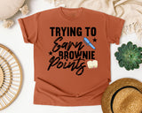Trying To Earn Brownie Points graphic tee in Yam