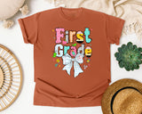 First Grade Paper Bow graphic tee in Yam