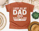 I Keep All My Dad Jokes In My Dad-A-Base White graphic tee in Yam