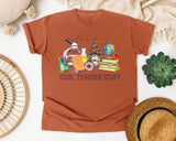 Busy Doing Cool Teacher Stuff graphic tee in Yam
