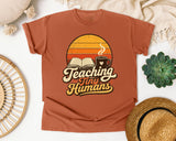 Teaching Tiny Humans Retro Sunset graphic tee in Yam