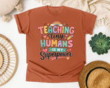 Teaching Tiny Humans Is My Superpower graphic tee in Yam