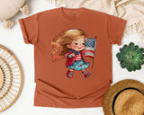 Girl Waving American Flag graphic tee in Yam