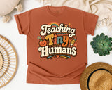 Teaching Tiny Humans Retro graphic tee in Yam