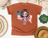 Girl Holding Large Flag graphic tee in Yam