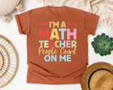 Im A Math Teacher People Count On Me graphic tee in Yam