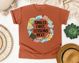 Smiles First Lessons Next graphic tee in Yam