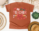 Teacher Hearts And Roses graphic tee in Yam