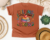 Helping Little Minds Grow Books graphic tee in Yam
