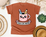 Teach Love Inspire Mug graphic tee in Yam