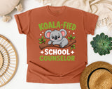 Koala-fied School Counselor Light Print Graphic Tee graphic tee in Yam