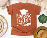 Roaring Into 4th Grade White 2 graphic tee in Yam