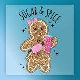 The Sugar & Spice Gingerbread Holiday Design by InkMerge features a sparkling gingerbread girl with a pink bow, oven mitt, and drink cup on a blue background with "SUGAR & SPICE" and black stars—ideal for any DTF transfer.