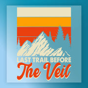 The Retro Mountain Landscape 'The Veil' by InkMerge features layered yellow, orange, and red stripes over stylized mountains and pines with “Last Trail Before The Veil” text—ideal as a premium heat press transfer for retro landscape fans.