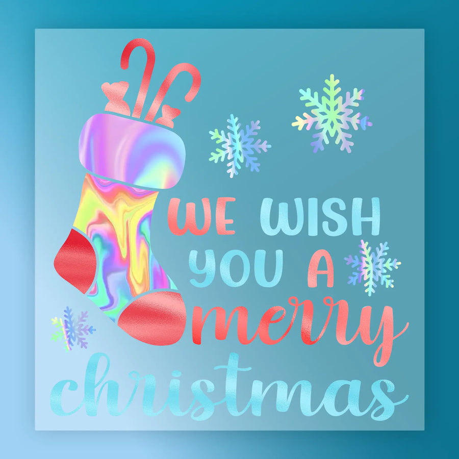 The InkMerge Merry Christmas Stocking Design holiday card features a shiny stocking, candy canes, snowflakes, and "We wish you a Merry Christmas" in pastel blue, red, and pink on a blue background.