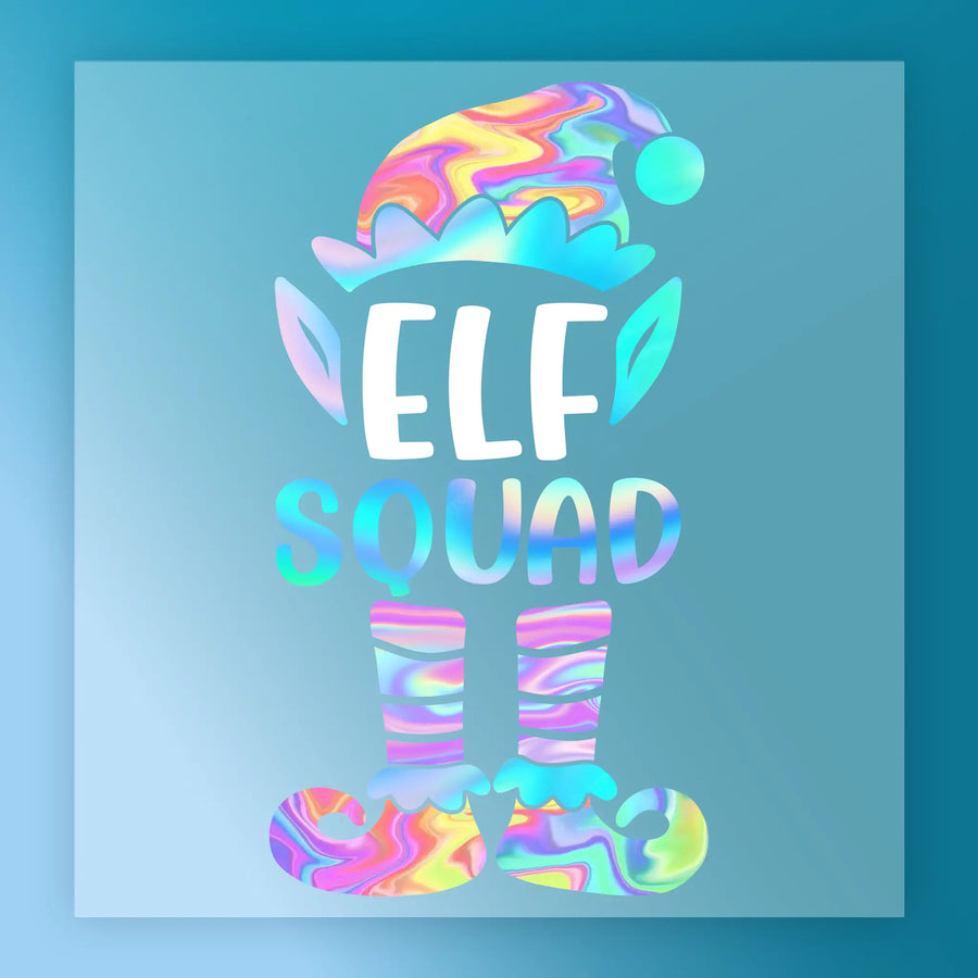 InkMerge’s ELF Holographic Swirl features a vibrant graphic of an elf hat, ears, legs, and shoes with “ELF SQUAD” text in holographic swirl on blue—ideal for custom apparel or DTF transfers.