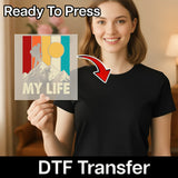 A smiling woman in a black shirt holds a colorful InkMerge Retro Vertical Stripes Design Direct-to-Film transfer. Text reads "precut ready to press" and "DTF Transfer.