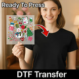 A smiling woman in a black shirt holds an InkMerge Christmas Nurse DTF Transfer - HO HO HO Apple Crisp Humor Ready to Press, featuring festive medical illustrations and 8-pass DTF technology, with colorful “Ready To Press” and “DTF Transfer” text.