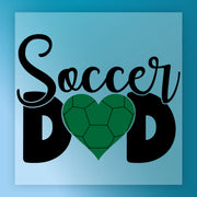 a graphic design with the text "Soccer Dad" and a heart shape.