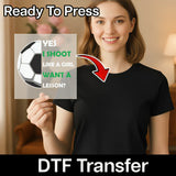 A woman holding a sign with a soccer ball and text on it, with a red arrow pointing to her chest.
