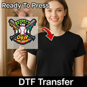 A smiling woman holding a sign with a colorful graphic design featuring a baseball bat and a baseball.