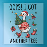 The InkMerge “Oops I Got Another Tree Goose” features a goose in a Santa hat, red sweater, and boots carrying a Christmas tree, surrounded by festive items—ideal for DTF transfer with your heat press! Text: "Oops! I got another tree.